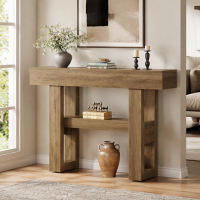 Console étroite de 105 cm (41,34 po) avec deux tablettes ouvertes, style ferme, pieds en H et patins de protection pour l'entrée et le hall.