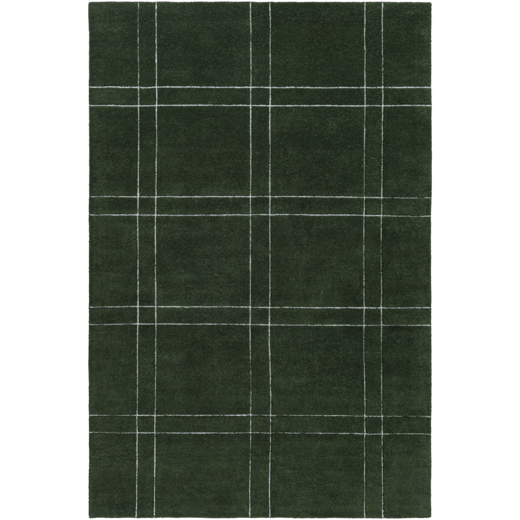 Tapis vert touffeté à la main