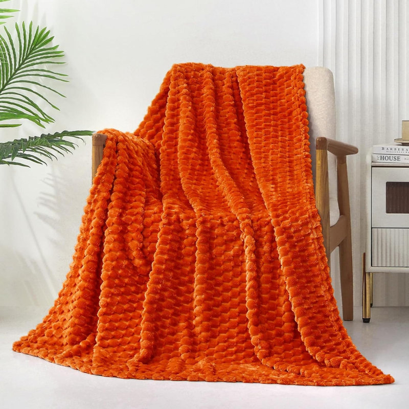 Jeté tricoté, Orange