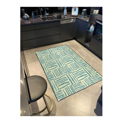 Tapis vert lavable rayé à motif thématique