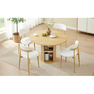 La table de salle à manger ronde de 47,24 po avec deux chaises de salle à manger allie les styles moderne et campagnard, avec une tablette de rangement à deux niveaux, idéale pour les salles à manger ou les espaces de vie.
