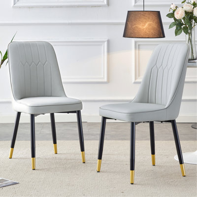 Chaises de salle à manger et de salon gris clair. Matériau en polyuréthane et pieds en métal, convient à la cuisine, au salon et à la salle à manger, ensemble de 2 pièces (gris clair et pu)