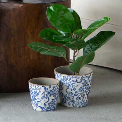 S / 2 jardinières en céramique bleue et blanche à motif floral