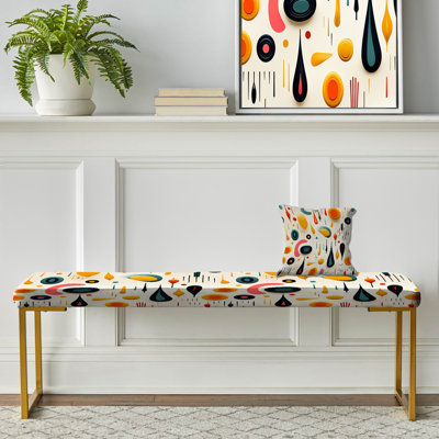 Banc rembourré géométrique doré