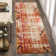 Hertzler Southwestern Orange Area Rug