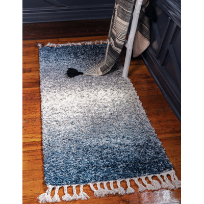 Tapis bleu à rayures Mitzy