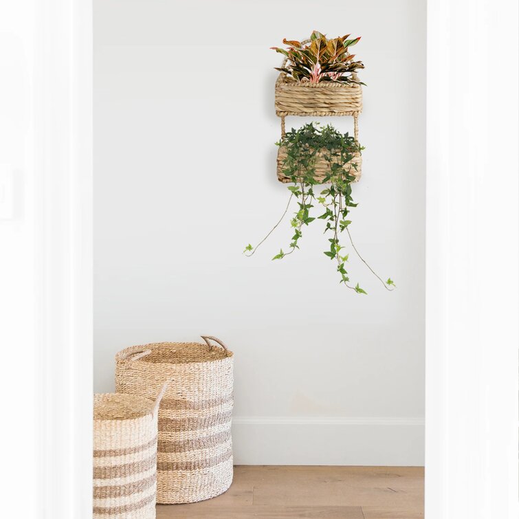 https://assets.wfcdn.com/im/76333068/resize-h755-w755%5Ecompr-r85/1147/114767708/Lapinski+Wicker+Wall+Organizer+with+Wall+Baskets.jpg