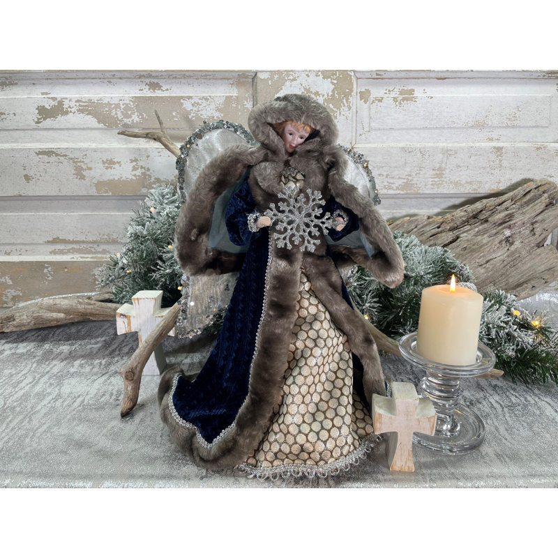 Ange bleu d'hiver avec flocon de neige