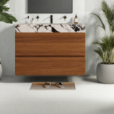 Meuble-lavabo moderne peu encombrant avec comptoir en faux marbre et lavabo en céramique, idéal pour les petites salles de bain