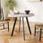 Versatile Circular Dining Table with Industrial Appeal for Various Settings