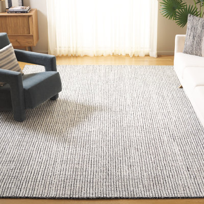 Rowe Handmade Tufted Ivory/Black Area Rug