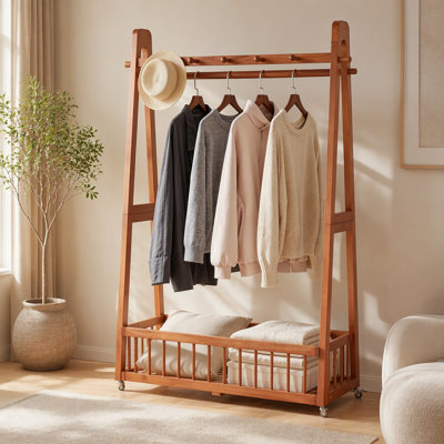 Portant à vêtements autoportant en bois massif, support à vêtements mobile en bois avec roulettes verrouillables, tringle à crochets à plusieurs crochets et grand panier de rangement inférieur pour chambre à coucher, placard, vestibule