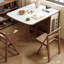 Table de salle à manger extensible en bois massif de 66 po avec 4 chaises de rangement sur roulettes, plateau en pierre résistant aux égratignures, peu encombrant et entièrement assemblé