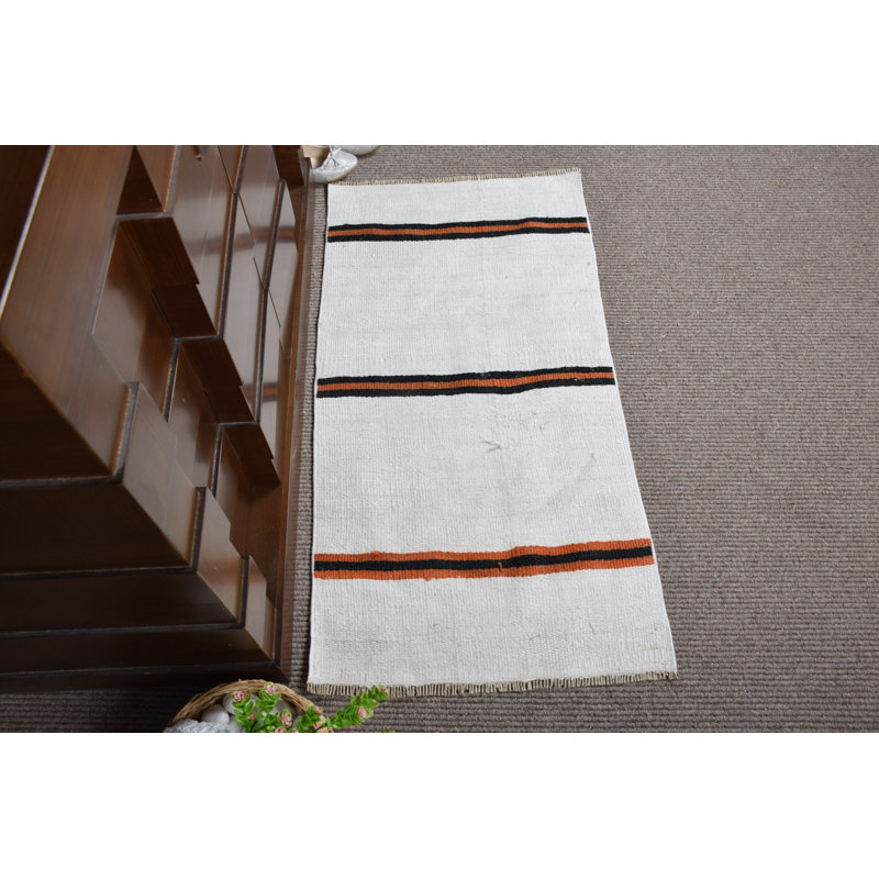 Tapis de porte turc fabriqué à la main dans un style rétro avec des rayures blanches et oranges frappantes