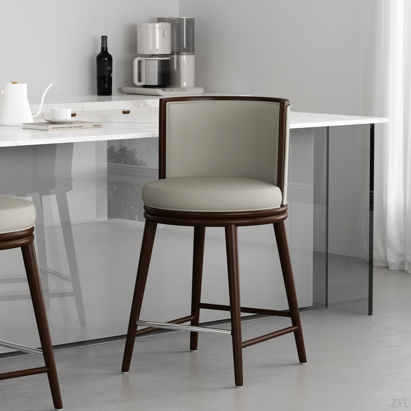 Tabouret de comptoir en similicuir Evalyn avec pieds en bois de hêtre, Gris