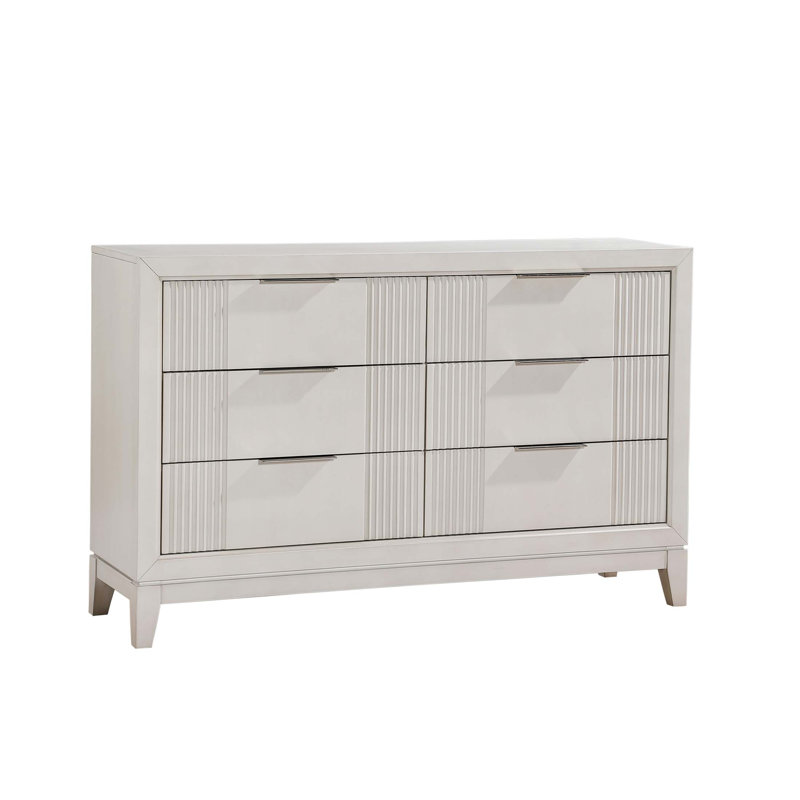 Commode moderne à 6 tiroirs avec façades en roseaux et finition blanc antique pour un rangement élégant dans la chambre à coucher