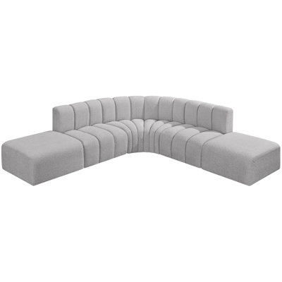 Issic Upholstered Curved Sectional with Ottoman Reversible