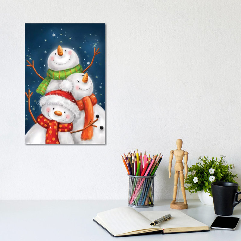 Three Snowmen Blue Background by MAKIKO - Wrapped Canvas Print, 20.32 cm H x 30.48 cm W