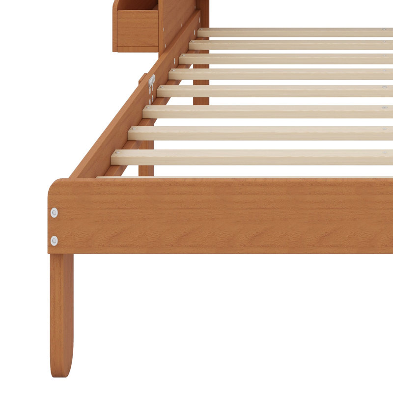 Base de lit plateforme avec tête de lit courbée et rembourrée, pieds arqués et rangement latéral pour les chambres à coucher modernes