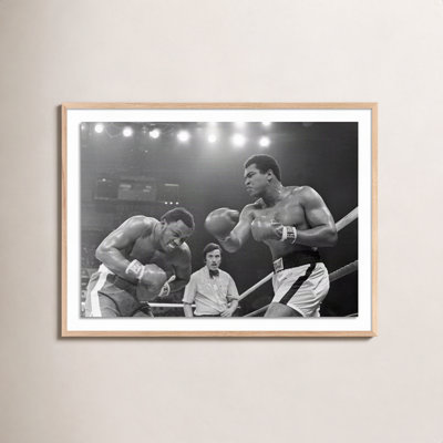 Adom "Muhammad Ali Punching Joe Frazier" Print