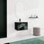 Meuble-lavabo mural 24 po. Contreplaqué noir avec porte à fermeture en douceur. Évier en céramique pour une salle de bain moderne.