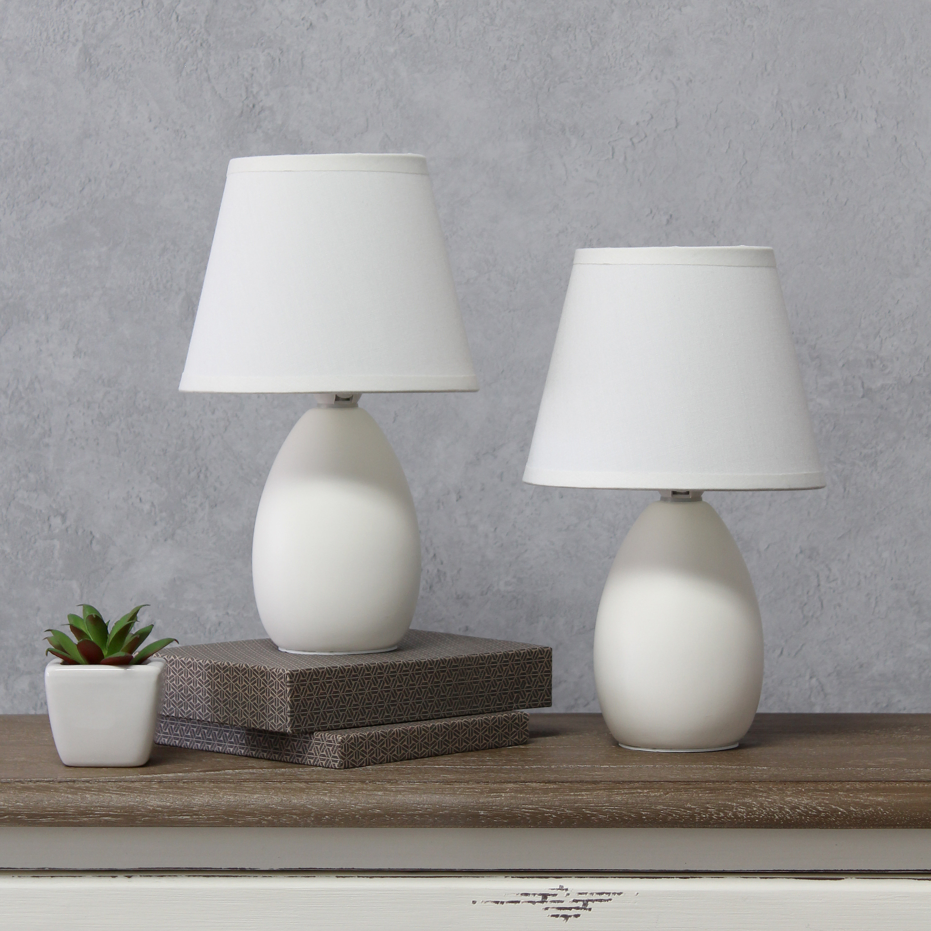 https://assets.wfcdn.com/im/76392337/compr-r85/2436/243667962/arzan-ceramic-table-lamp.jpg