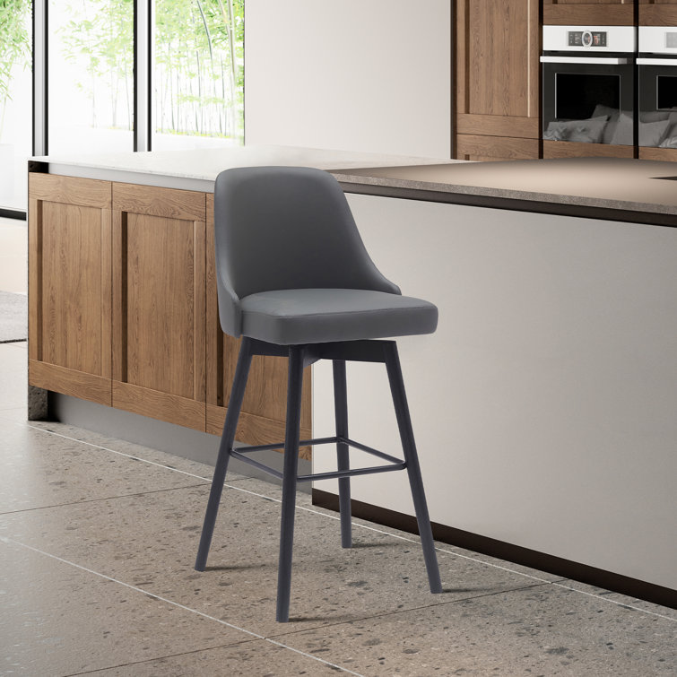 Orfield Modern Swivel Counter or Bar Height Upholstered Armless Bar Stool with Footrest in Wood