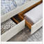 Grand lit beige avec rangement intégré et support ergonomique, parfait pour le confort moderne et l'organisation-505851578-505851577