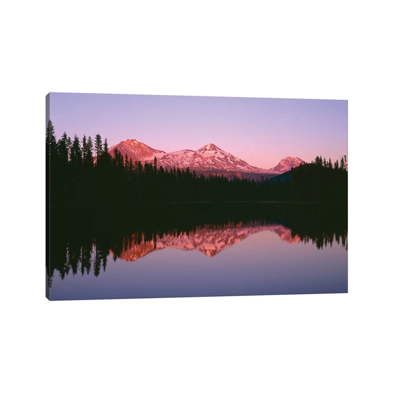 Or, Willamette Nf. Sunset Reddens The Three Sisters Which Reflect In Scott Lake. by John Barger - Wrapped Canvas Print
