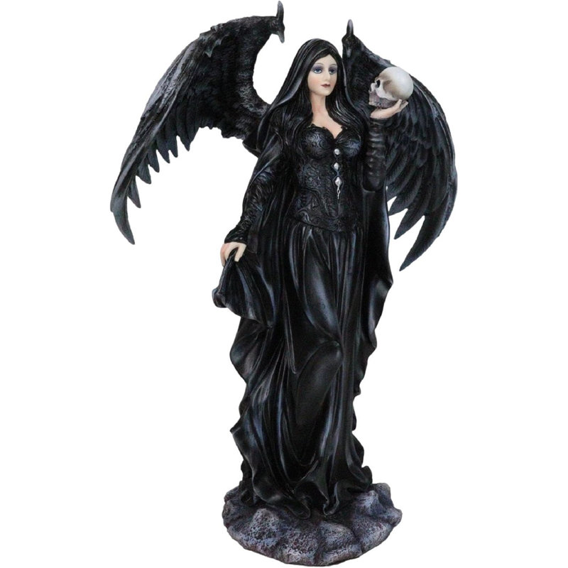 Figurine gothique de fée voilée avec des ailes de corbeau tenant un crâne noir