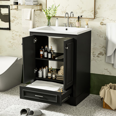 Meuble-lavabo de 24 po avec lavabo en céramique - meuble autoportant noir, conception élégante, poignées argentées, rangement moderne et imperméable, fonction de fermeture en douceur, détails,
