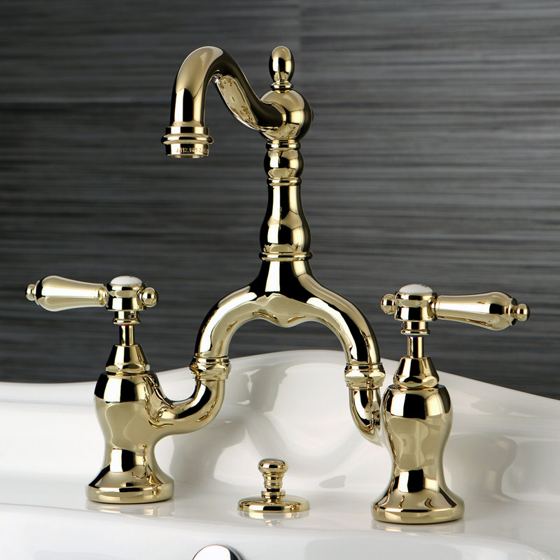 Kingston Brass Heirloom Two-Handle 3-Hole Deck Mount Bridge Bathroom Faucet with Brass Pop-Up, Polished Brass