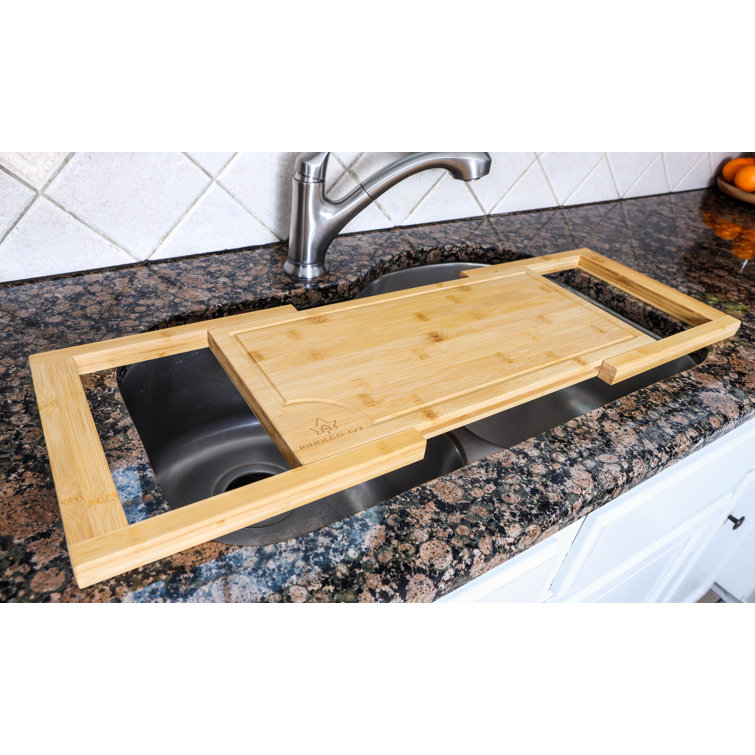 https://assets.wfcdn.com/im/76431601/resize-h755-w755%5Ecompr-r85/2380/238034640/Expandable+Over+The+Sink+Bamboo+Cutting+Board.jpg