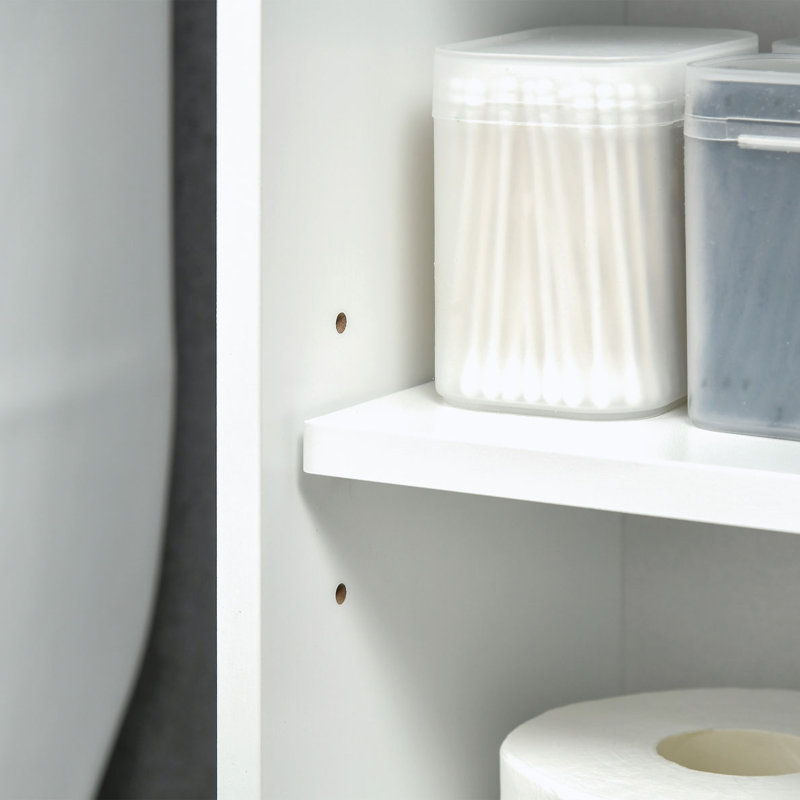 Armoire de rangement au-dessus de la toilette