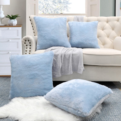 Housse de coussin réversible en fausse fourrure