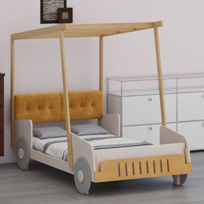 Lit en forme de voiture avec coussin et plafond à baldaquin