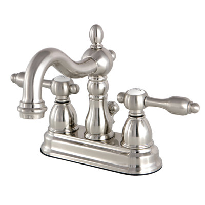 Kingston Brass Tudor Two-Handle 3-Hole Deck Mount 4" Centerset Bathroom Faucet with Brass Pop-Up