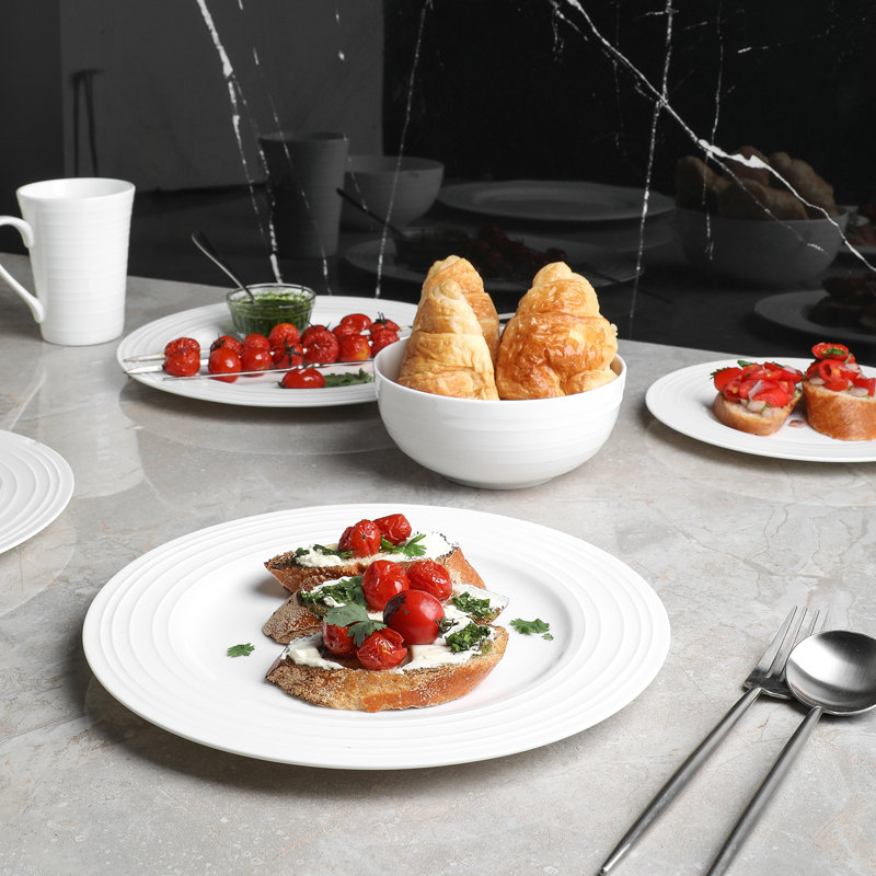 Elegant White Porcelain 16-Piece Dinnerware Set with Swirl Design