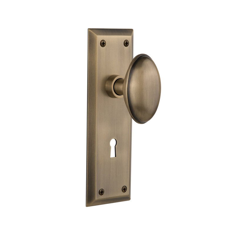 New York Plate with Decorative Keyhole and Homestead Door Knob, Antique Brass