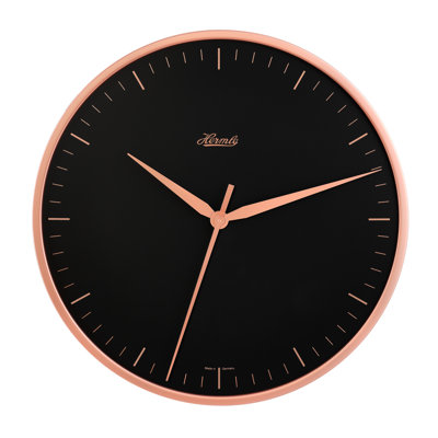 Sleek, modern wall clock in rose gold. Quartz time only movement.