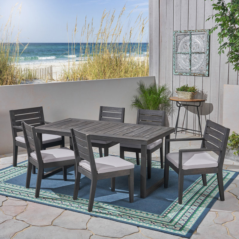 Ajoloko 6 - Person Acacia Patio Dining Set with Rectangular Table , Cushions Included, Dark Gray Frame / Light Gray Cushion
