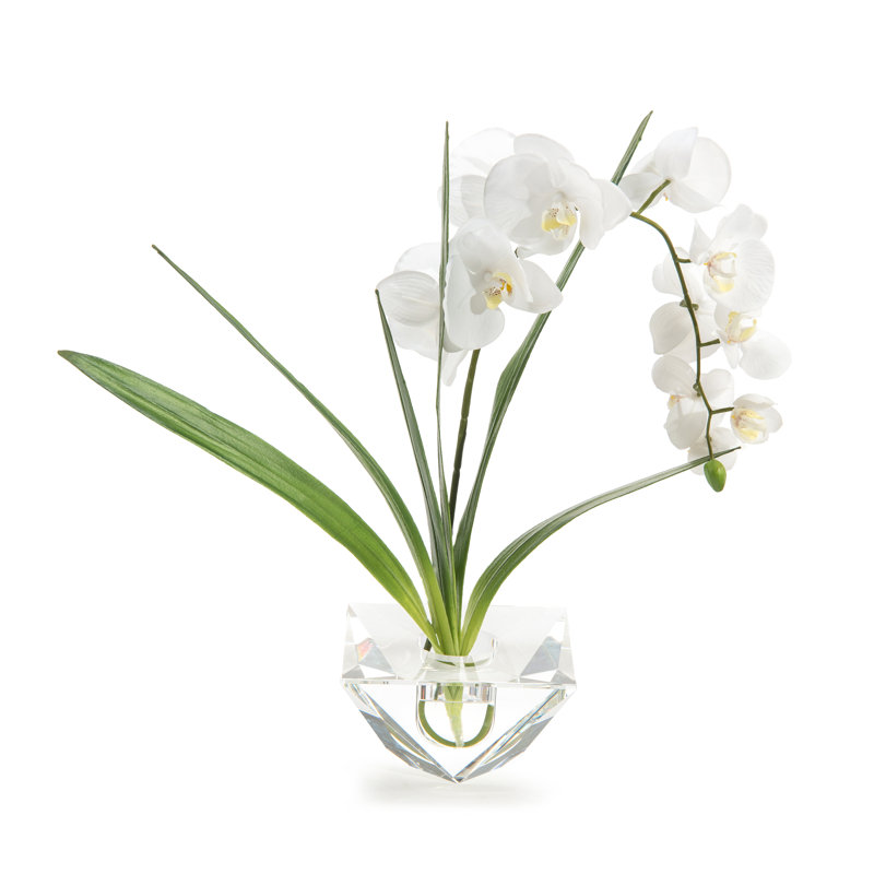 Faux Flowering Plant in Glass Pot