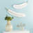 CosmoLiving by Cosmopolitan White Polystone Feather Bird Home Wall Decor-19723100