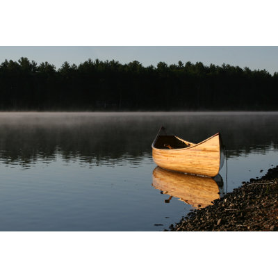 Beached Canoe - Wrapped Canvas Print