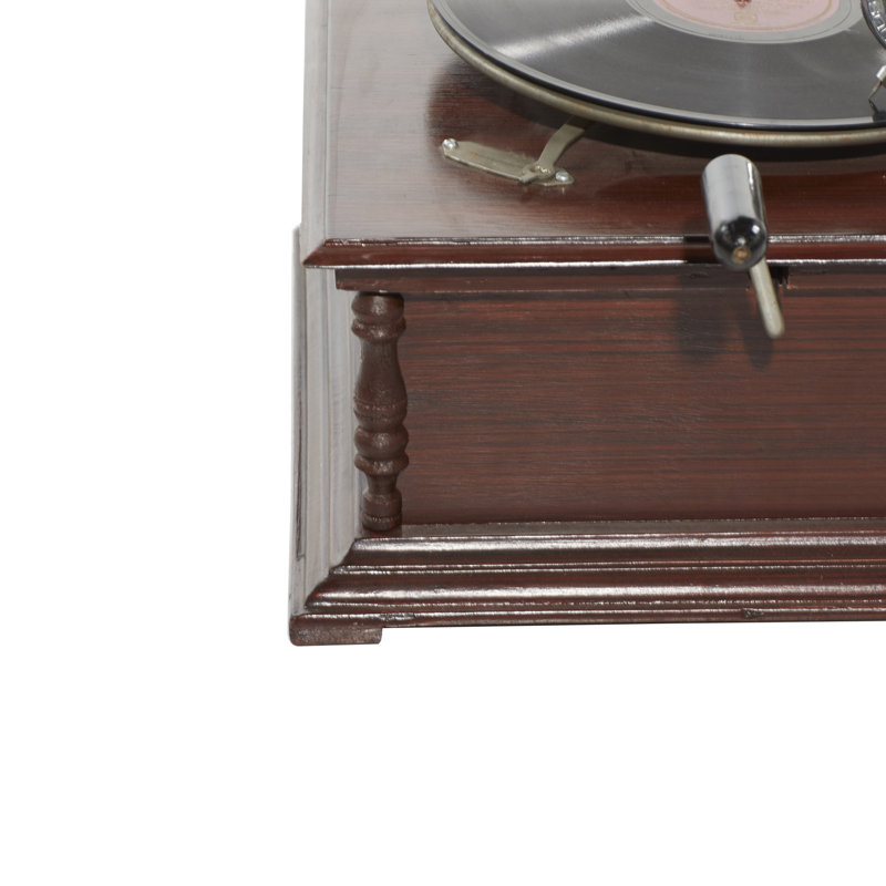 Gramophone brun en bois avec disque