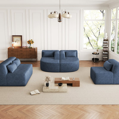 Salon bleu avec deux chaises longues et cinq coussins en forme de L pour un soutien optimal