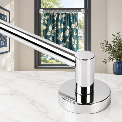 Polished chrome magnetic curtain rod adjusts from 16-28" with a tool-free no-drill magnetic mount, strong magnet hold, and silicon protective cover for doors, classroom whiteboards, or towel-bar use.