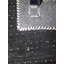 Ovide Polka Dots Area Rug in Black
