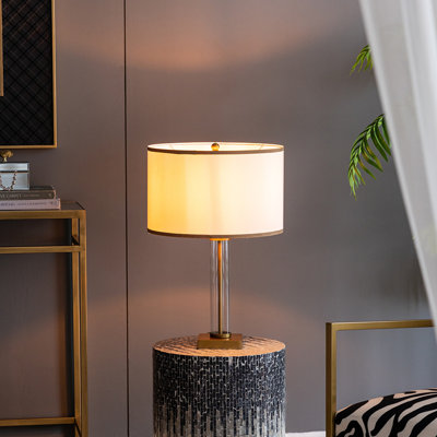 Lampe de table avec cylindre en verre et base piédestal