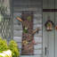 Rangement mural suspendu en toile brune pour outils de jardin